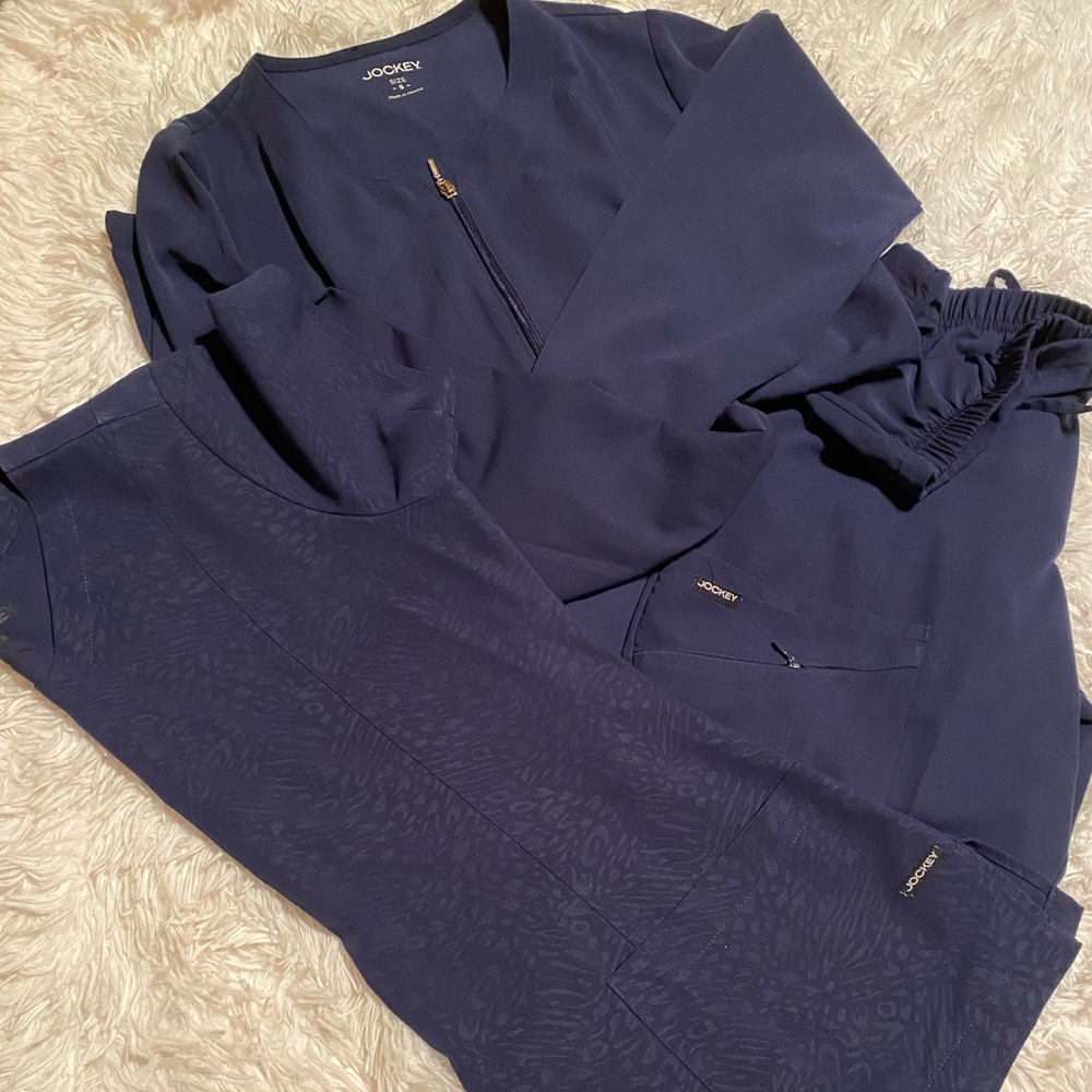 Jockey Navy Blue Scrub Set. Medium sized pants and top. Size small jacket.